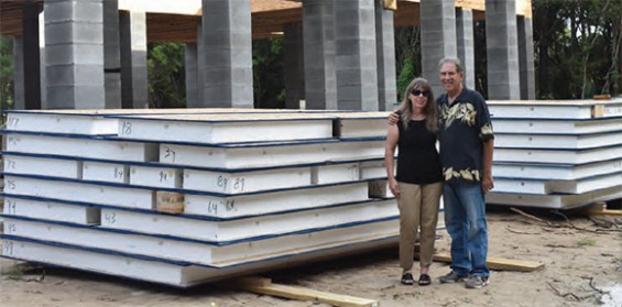 Stan and Suzanne Gorlitsky admire the foundation of what will soon be their new home.