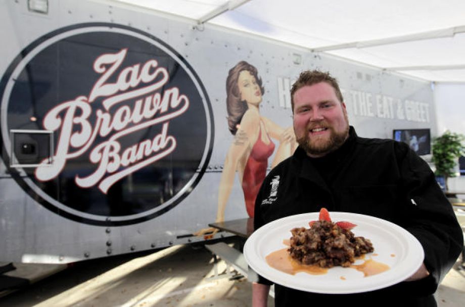 Hamlin in front of Cookie his mobile kitchen