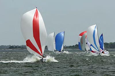 Sperry Charleston Race Week 2017, colorful keelboats in Charleston Harbor