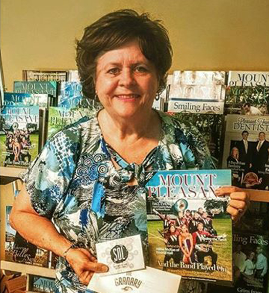 Carol Hughes winning multiple gift cards to local restaurants.