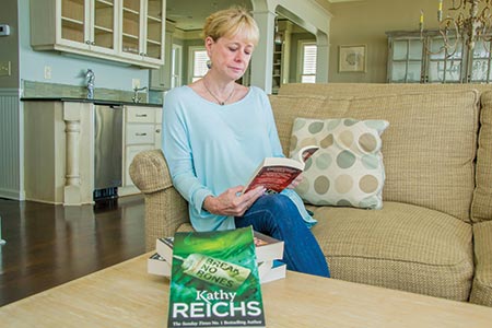 Kathy Reichs with some of her books