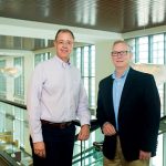 Architect Sam Herin, left, and Dennis Knight of Whole Building Systems were among the professionals who played a key role in creating a state-of-the-art, energy-efficient Town Hall.