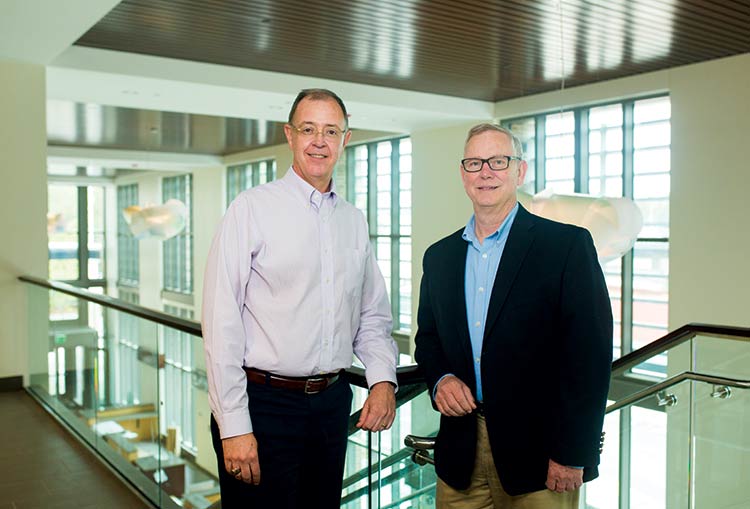 Architect Sam Herin, left, and Dennis Knight of Whole Building Systems were among the professionals who played a key role in creating a state-of-the-art, energy efficient Town Hall.