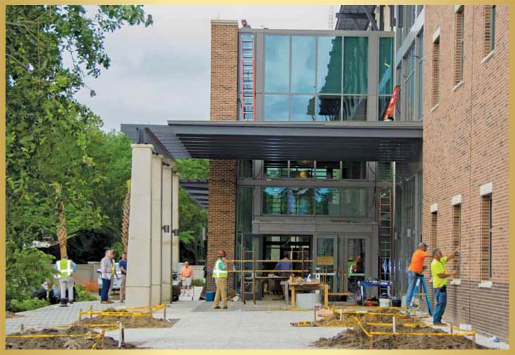 Workers put the final touches on the outside of the new Mount Pleasant Town Hall.