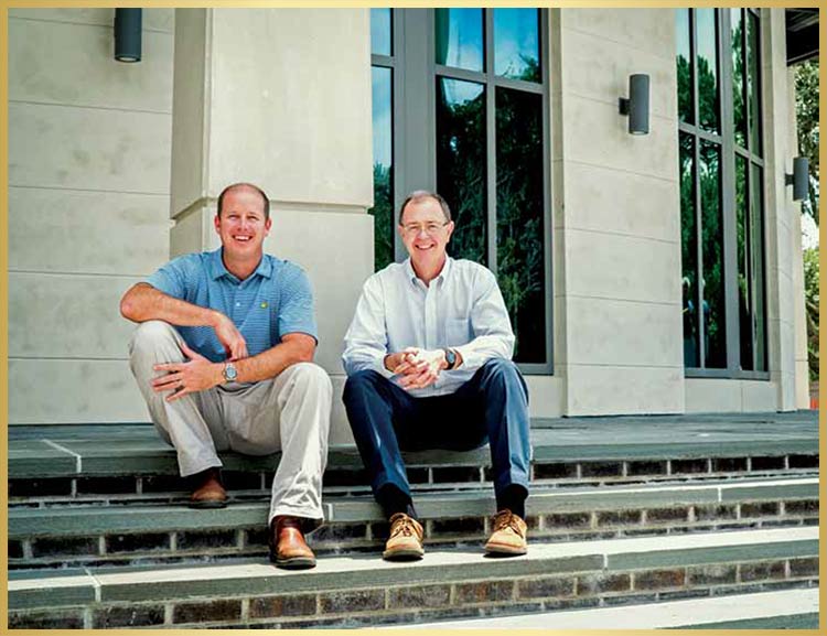 Project Manager Brooks Blumenthal, l e ft, and Architect Sam Herin on the front steps of Mount Pleasant ’s new Town Hall.