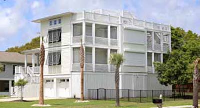 Lowcountry Hurricane Protection & Shutters. Photo of a home with hurricane protection