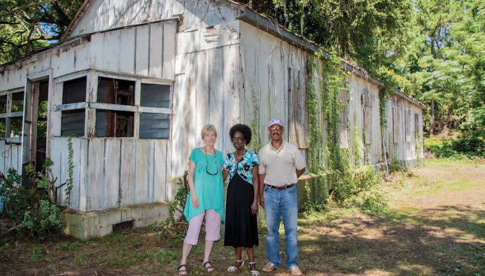 Pat Sullivan, Thomasena Stokes-Marshall and Freddie Jenkins in front of Long Point Elementary School, the last remaining African-American schoolhouse East of the Cooper.