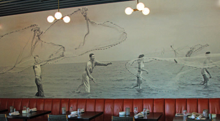 The mural isn’t a work of fiction but a replica of an old photograph discovered at the State Library and Archives of Florida by Grace & Grit’s graphic designer, Gil Shuler, and installed by Brilliant Wall & Ceiling Systems.
