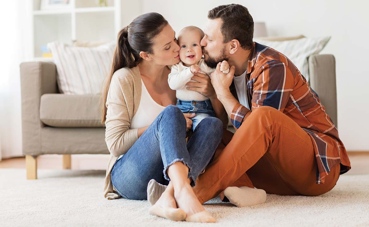 Adoptive parents with their toddler