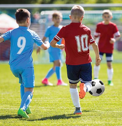 Boys playing soccer