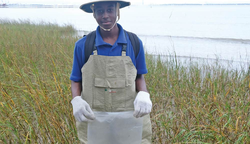 Burke H.S. student participates in the oyster bed restoration project