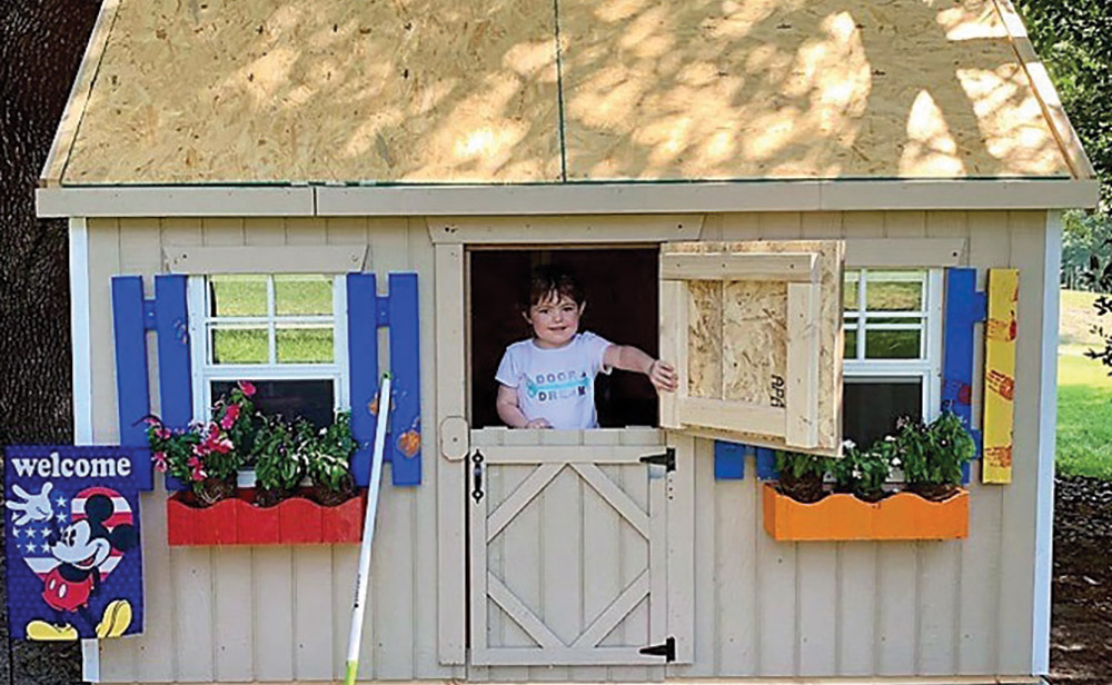 Elia’s new playhouse is just the right size for her.