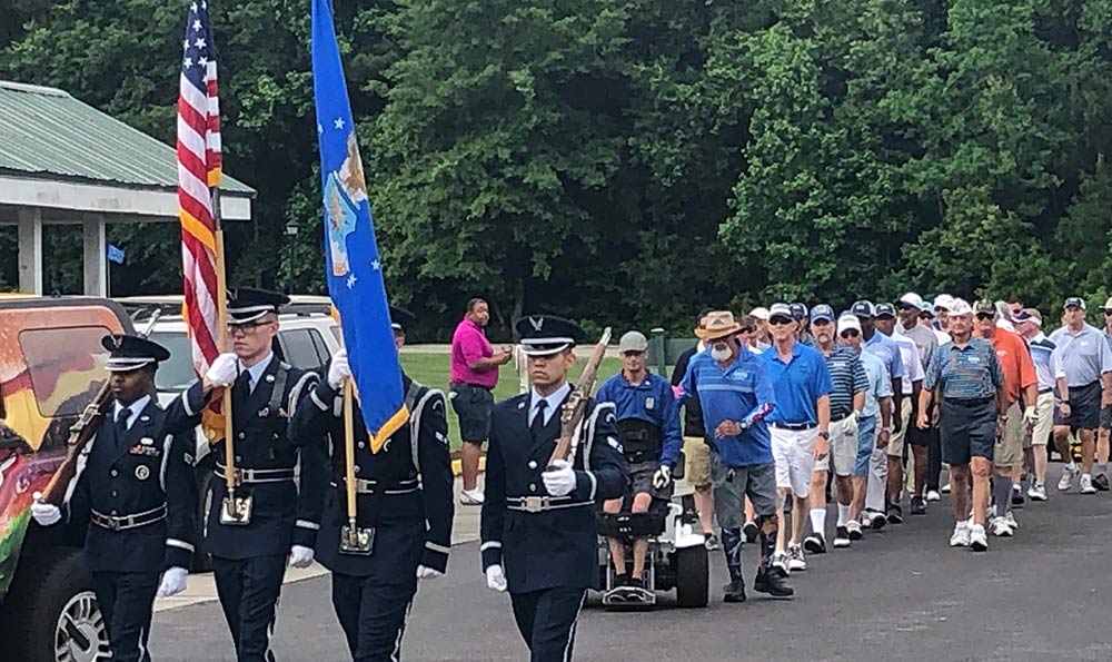 PGA HOPE veterans passing in review at The Golf Club at Wescott Plantation.