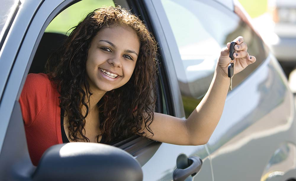 Teenage girl Driving her car. Girl with car Keys.