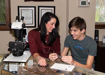 Nan Butler, owner of Skatell’s Manufacturing Jewelers, and her son Will.