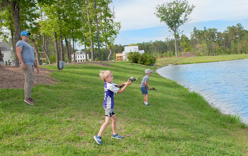 Teaching fishing. Photo by Juli K.