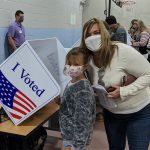 Kristie Rasheed took her daughter Stella to observe her mother and father perform their civic duty as they voted.