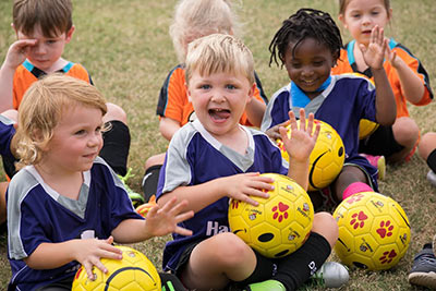 Happy Feet introduces a love of soccer to youngsters with Bob, the smiley face soccer ball.