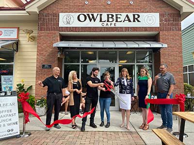 Kathy Landing at the Owl Bear Ribbon Cutting.