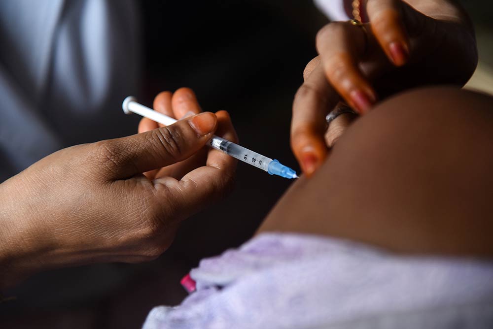 Patient getting an injection.