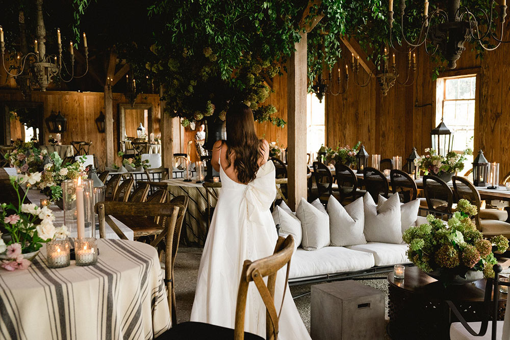 Natalie Knox, Director of Weddings & Events at Boone Hall Plantation,  admires the stunning decor at her reception.