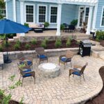 A back yard ptio by Set in Stone Hardscapes in Mount Pleasant, SC