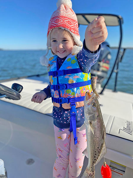 Captain Mike’s daughter, Sloan, proud of her fish.