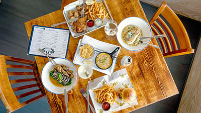 Table with a meal prepped at Islander 71, a new restaurant in Isle of Palms, SC