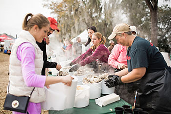Fun at the area’s largest oyster roast.