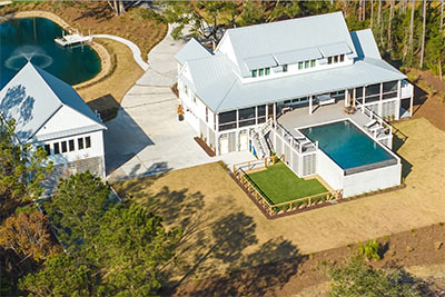 Beautifully designed backyard gathering area by GrandScapes.