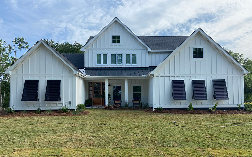 Beautiful Bahama shutters by Lowcountry Hurricane Protection & Shutters.