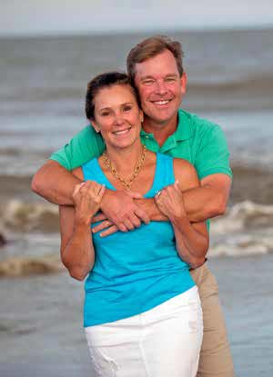 Brian and Sassy Henry on their beloved beach.