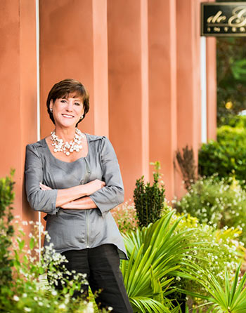 Gigi Chapman, founder of deGuise Interiors outside of the store in Mount Pleasant, SC