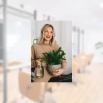Owner Whitney Miller with a blurred background photo