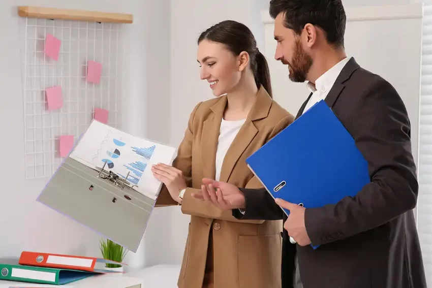 A couple at work together.