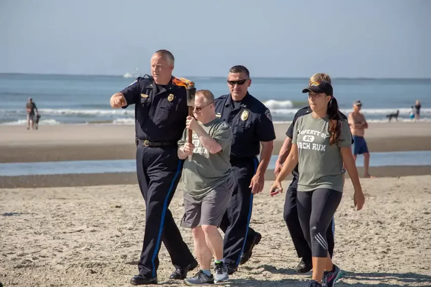 Ritchie and participants running the torch.