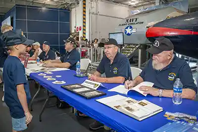 Brothers Ken (far right) and Dale (second from right end) Story served aboard the USS Yorktown