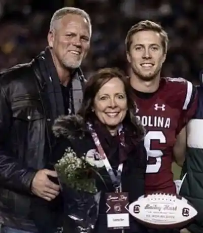Bailey Hart with his parents.