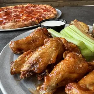 Pepperoni Pizza and Chicken Wings from Steel City Pizza.