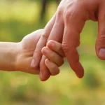 Holding dad's hand