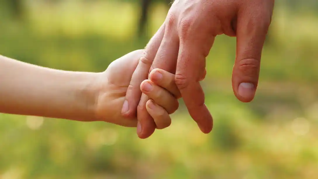 Holding dad's hand