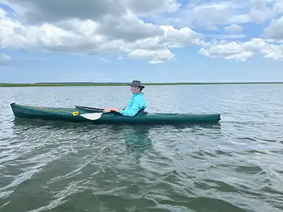 Capers Island camper Randy in his kayak.