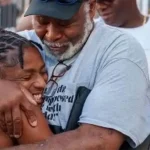 Georgetown native Melissa Jefferson hugs her father, Melvin Jefferson.