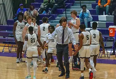 Philip Simmons Iron Horses Boys Basketball: Coach Campbell gives instruction during a timeout.