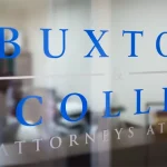 Buxton and Collie Attorneys at Law on a door inside the practice in Mount Pleasant, SC.