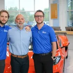 Photo of Starling Chevrolet's GM Joe Sarro (center) with his sons Jarrett and Joey.