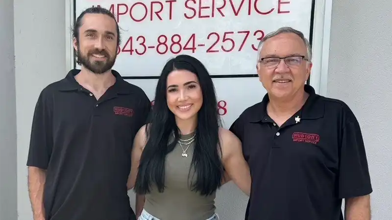 Hudson's Import Service Owner Cliff Hudson (far right) with his son Gains and daughter Caitlin.
