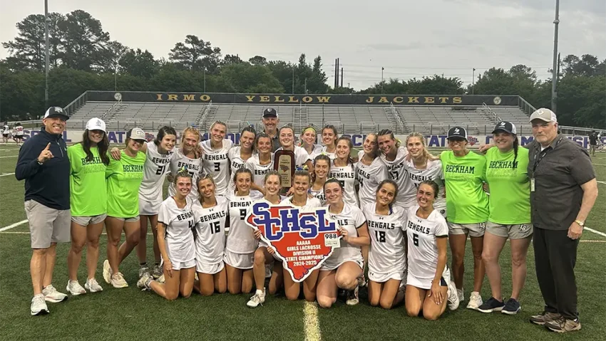 Lucy Beckham girls lacrosse after first-ever state championship..