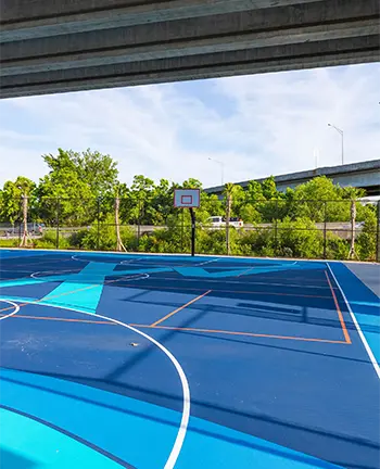 Mount Pleasant Waterfront Park: Two basketball courts are nestled under the on-ramp of the Ravenel.