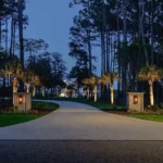 HOME FOR SALE: Beautiful night photo showing the driveway entrance to the property at 288 Tipperary Place, Pawleys Island, SC